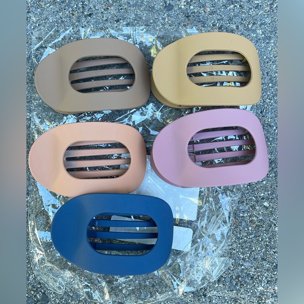 Brand new in plastic set of 5 flat hair clips, matte colors, lay flat design